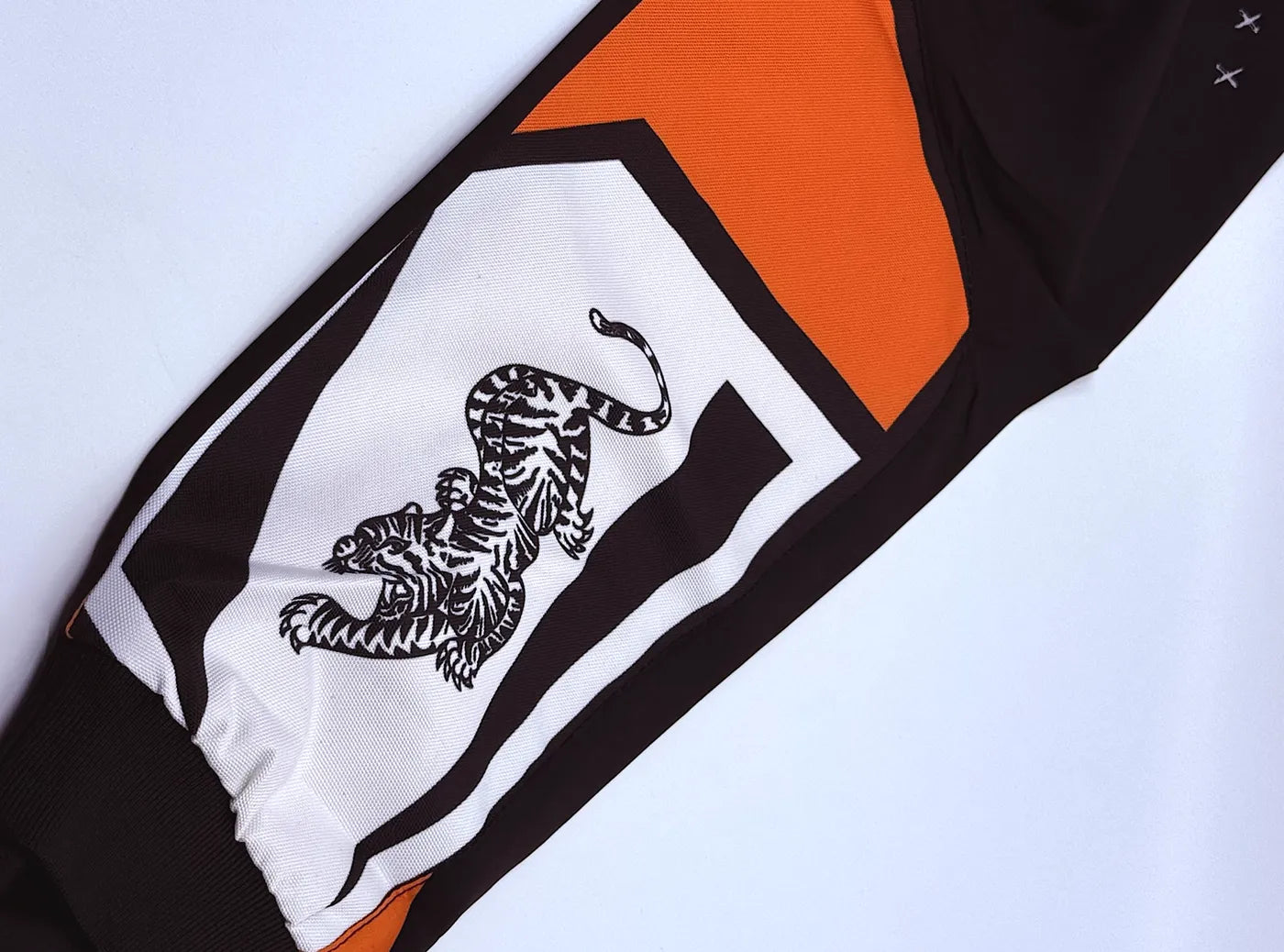 Orange and white tiger sleeve panel