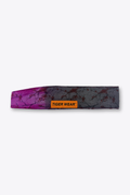 Bloom at Dusk paintball headband by Tigerwear in magenta to charcoal blossom print, laid flat with orange woven label