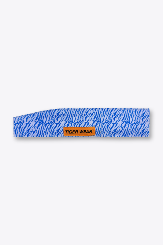 Cold Front paintball headband by Tigerwear in ice blue tigerstripe, laid flat with orange woven label