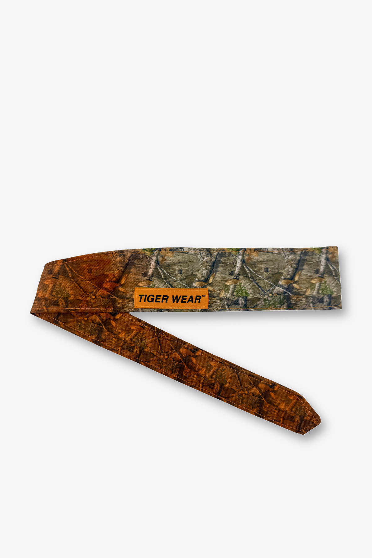 First Light paintball headband by Tigerwear in orange fade timber camo, tied, showing the tapered tail