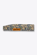 Brown field camo Tiger Wear paintball headband laid flat with orange woven label