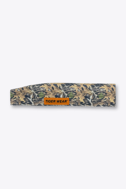 Brown field camo Tiger Wear paintball headband laid flat with orange woven label