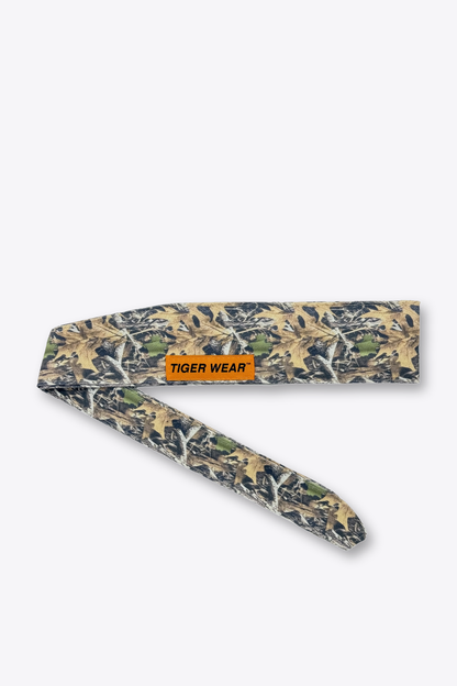 Brown field camo Tiger Wear paintball headband tied, showing the tail